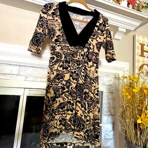 EUC, like new, Francesca’s tan and black dress size small